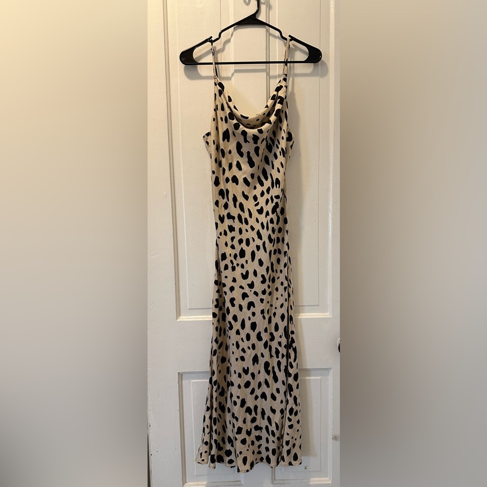 Animal print spotted cowl neck dress with side slits
